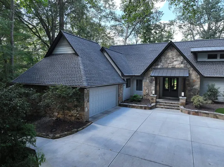 Completed roof installation with architectural shingles