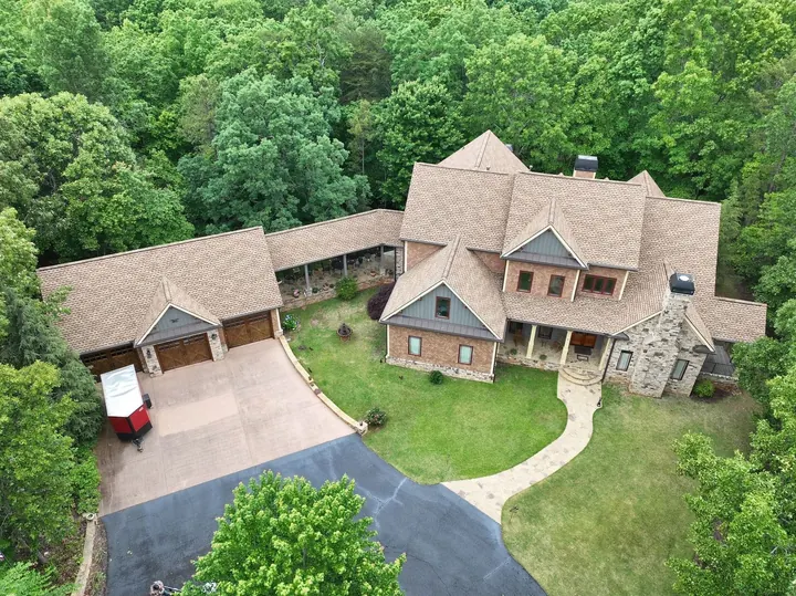 Aerial view of Shakewood shingle roof on brick home