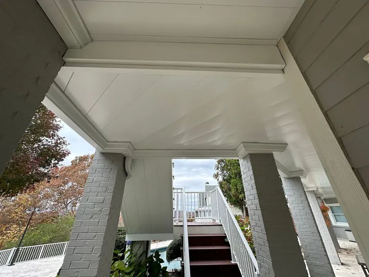 Underdecking installation beneath second-story deck