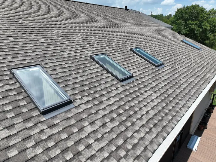VELUX skylight installation on shingle roof