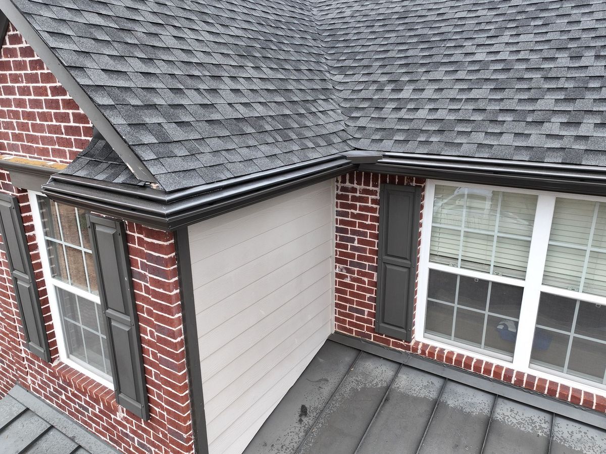 Gutter protection at a metal roof transition